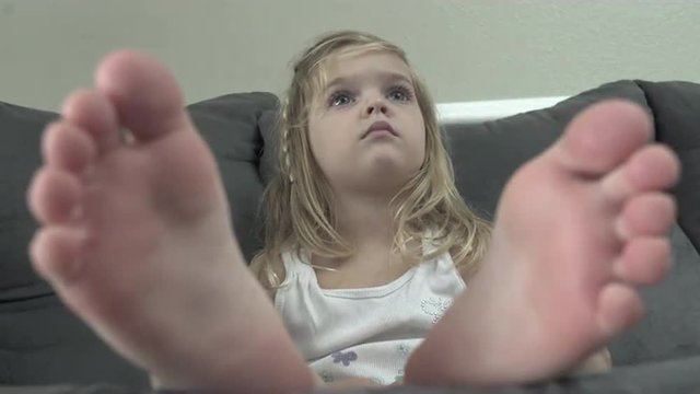 Views of a child engrossed in entertainment