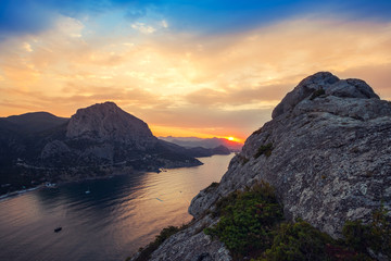 Plakat Sunrise in mountains and sea