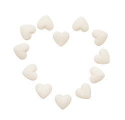 Fototapeta na wymiar Heart made of white heart shape tablets isolated on white background. Clipping path included.