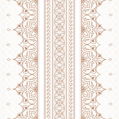 Vintage lace golden pattern on white.