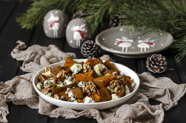 Salad with pumpkin, walnuts and blue cheese   