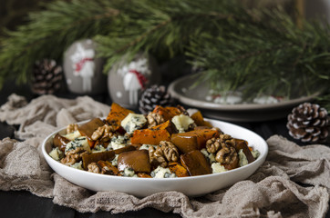 Salad with pumpkin, walnuts and blue cheese   