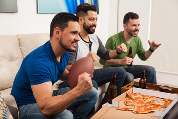 Friends watching american football