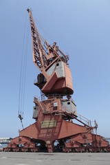 Fototapeta na wymiar Cranes at Harbor