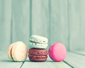 Colorful macaroons over vintage turquoise wood