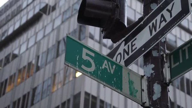 A shot of the world famous Fifth Ave street sign in Manhattan.