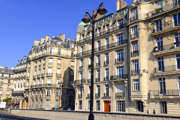 Fototapeta na wymiar Facade of building front along Seine River in Paris, France, Western Europe