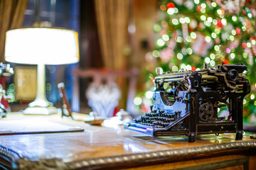 Retro Christmas interior with old typewriter