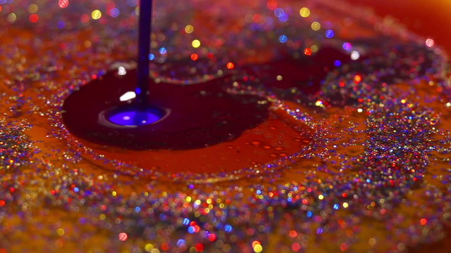 Sparkly Colorful Glitter With Oil Texture Background In Slow Motion