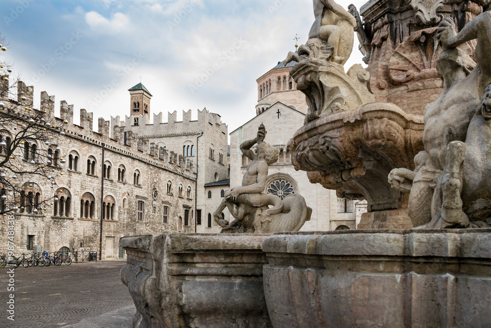 Wall mural the neptune fountain in cathedral square, trento, italy