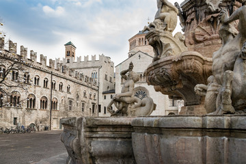 The Neptune fountain in Cathedral Square, Trento, Italy - obrazy, fototapety, plakaty
