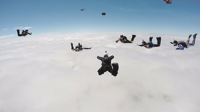 Skydiving above the clouds