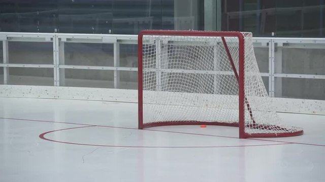 Views of hockey practice at an ice rink