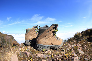 hiking boots on beautiful mountain peak