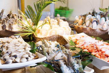 fresh seafood on table in cooking room