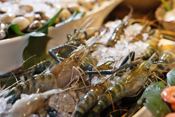 fresh seafood on table in cooking room
