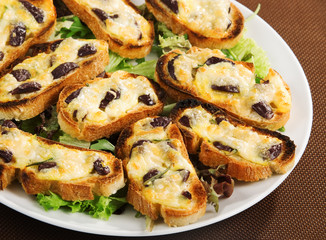 Bruschetta with olives and mozzarella