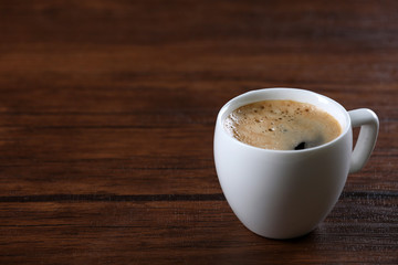 Cup of coffee on table close up
