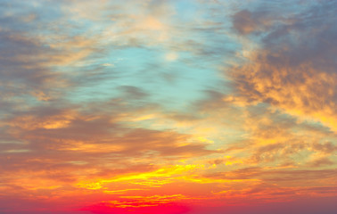 Naklejka na ściany i meble Beautiful sunset, light majestic clouds