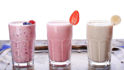 Milk shakes on white background