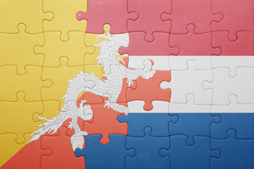 puzzle with the national flag of netherlands and bhutan