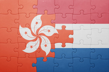 puzzle with the national flag of netherlands and hong kong