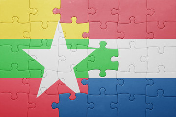 puzzle with the national flag of netherlands and myanmar