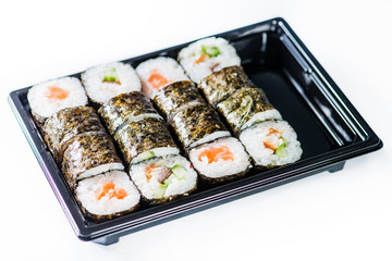 close-up of sushi roll in the black box, Sushi delivery. shallow