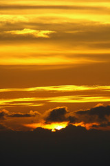 Sun disappears behind the clouds