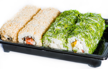 close-up of sushi roll in the black box, Sushi delivery. shallow