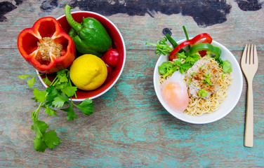 Chinese noodles with minced pork and egg in bowl