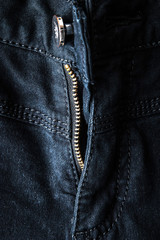 Unbuttoned zipper on jeans vertical