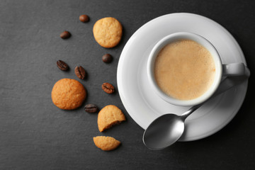 Cup of coffee on gray background