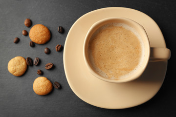 Cup of coffee on gray background