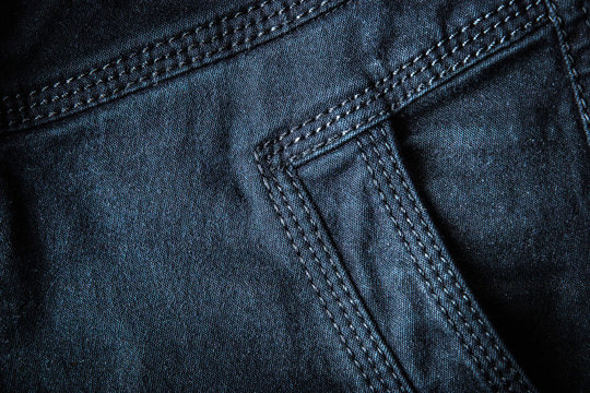Dark jeans with pocket background