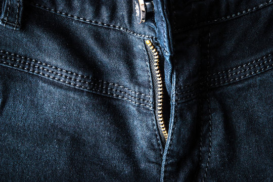 Unbuttoned zipper on jeans horizontal
