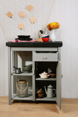 Kitchenware on table in the room