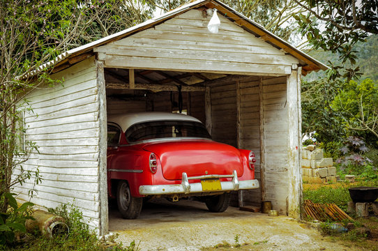 Classic American car park in garden sheed near Havana,Cuba.