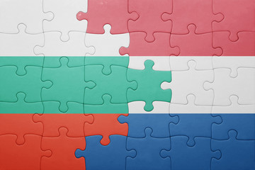 Fototapeta premium puzzle with the national flag of netherlands and bulgaria