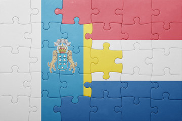 puzzle with the national flag of netherlands and canary islands