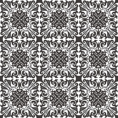 Seamless background image of gray tone spiral kaleidoscope geometry pattern.

