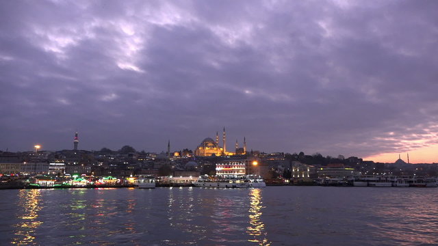 Famous landmark Suleymaniye Mosque and the surroundings  under a magnificent sky at sunset.