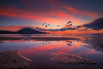colorful sky reflect in to ground water