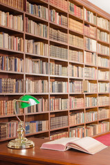 Library table with open book