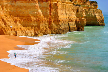 Benagil, Algarve, Portugal - October 27, 2015: Tourist enjoying Benagil Beach in Portugal