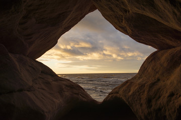 view on sunset from sandstone cave