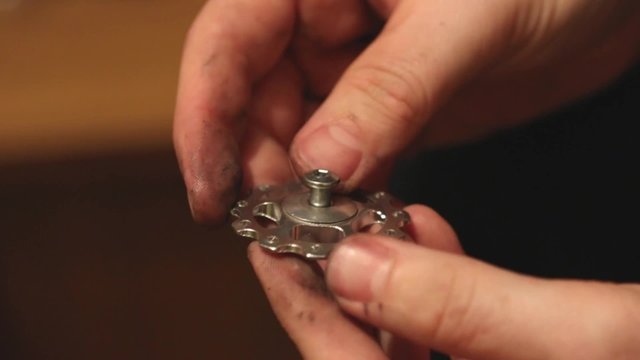 Man repairing bicycle detail