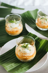Noodlse with fish curry sauce,shallow Depth of Field,Focus on basil leaf.