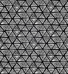 Ornate hand-drawn black and white triangles