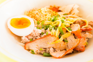 Asian red pork noodle with egg soup